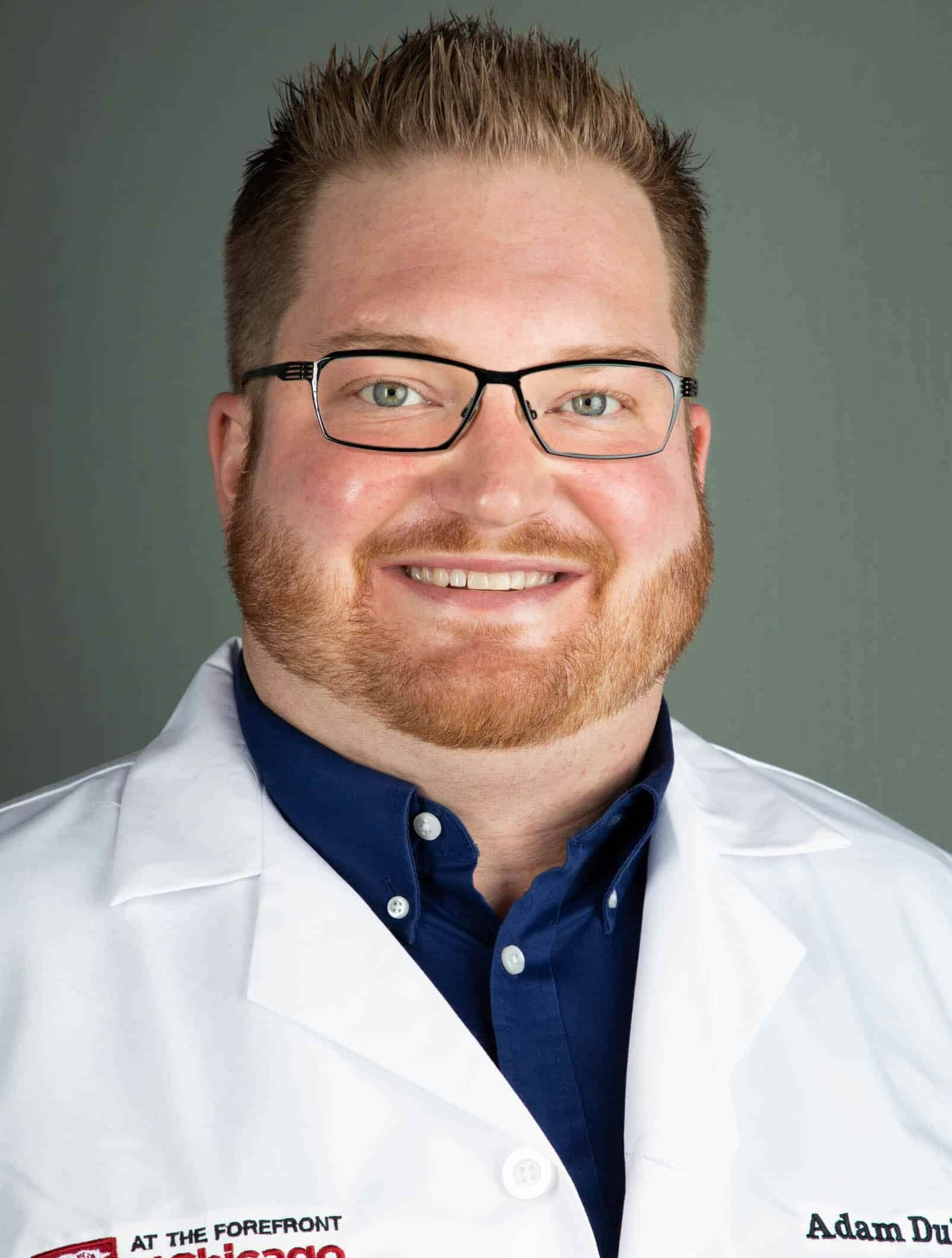 DuVall Adam Faculty Headshot e1679954917496